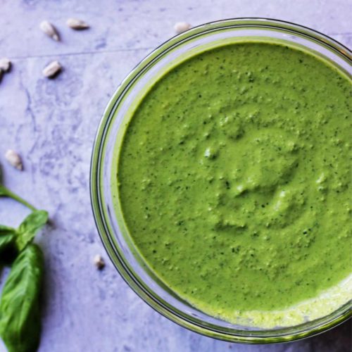 Bowl of vegan pesto that is oil-free and nut-free.