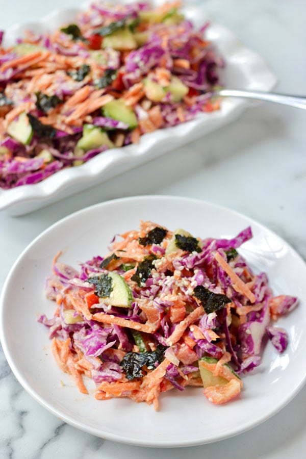 Asian sesame slaw on a white plate