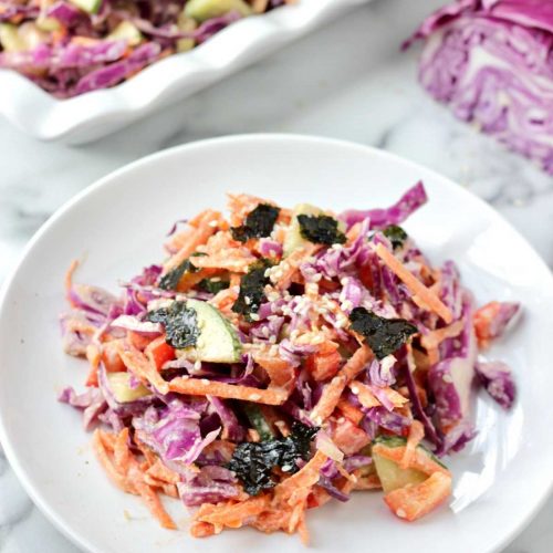 Vegan Asian Slaw with creamy ginger dressing on a plate.