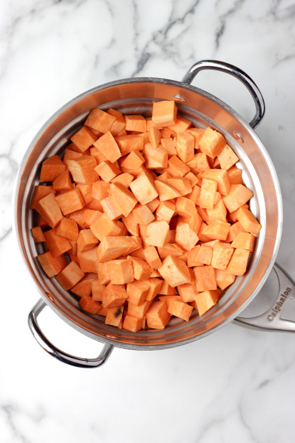 Sweet potatoes in steamer basket