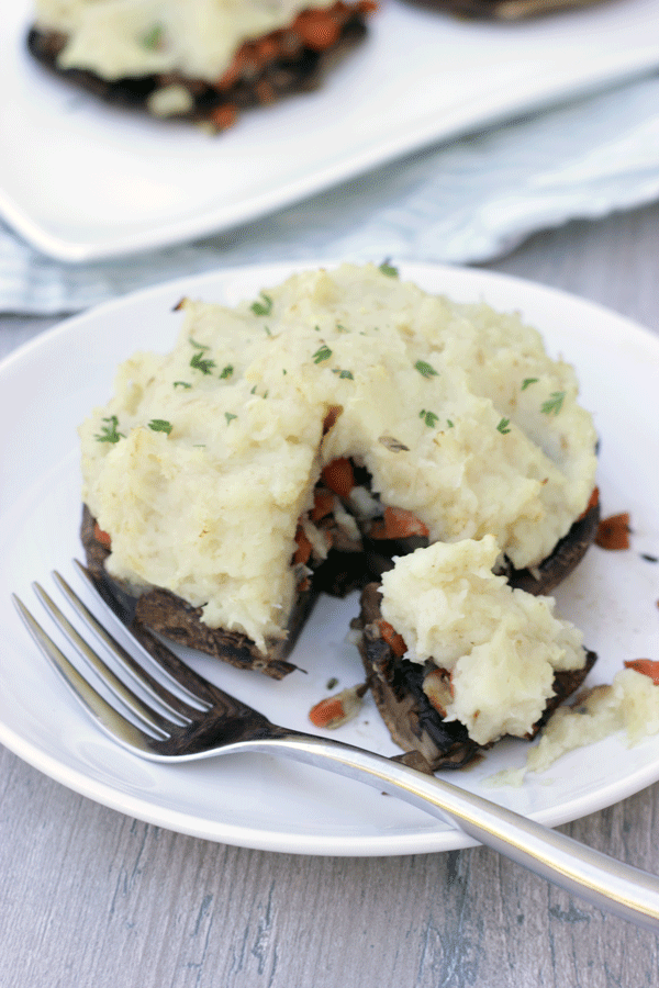 PoPortobello Shepherd's Pie on white plate with fork