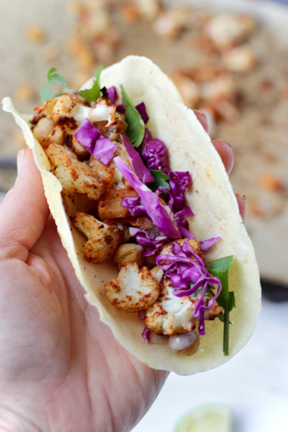 Cauliflower taco with chickpeas and cabbage.