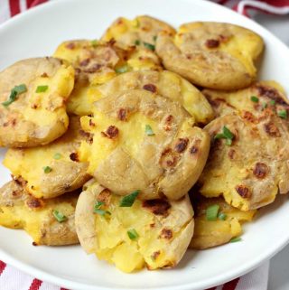 Plate of oil-free garlic smashed potatoes.
