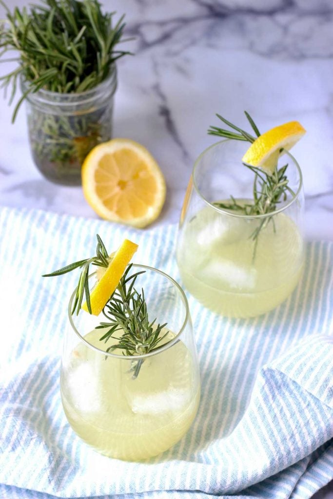 Rosemary Ginger lemonade in wine glasses