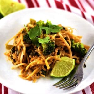 Tofu pad thai in a bowl with a fork.