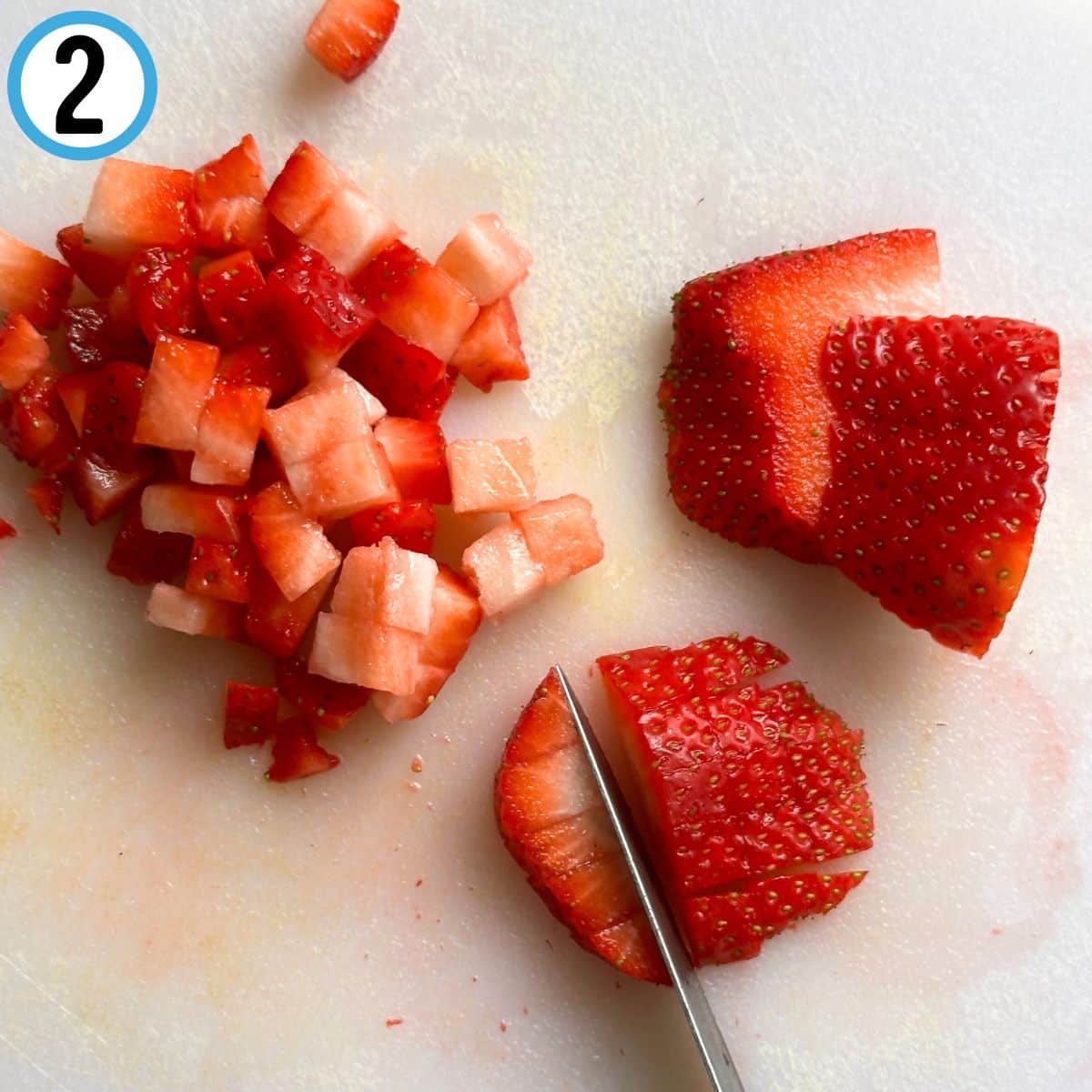 Chopping strawberry finely.