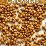 Roasted sriracha chickpeas on a baking sheet in an even layer. Text reads "sriracha lime chickpeas" and "alternativedish.com" in bold block lettering.