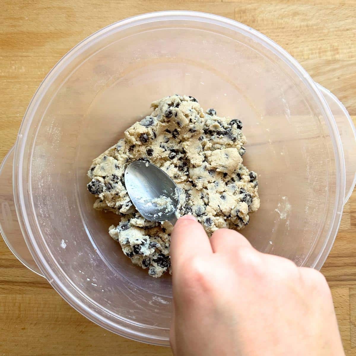 Mixing the entire dough with chocolate chips.