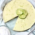 Avocado key lime pie with a slice taken out of it.