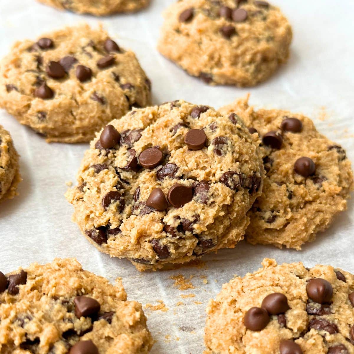 Baked chickpea cookies resting on top of one another.