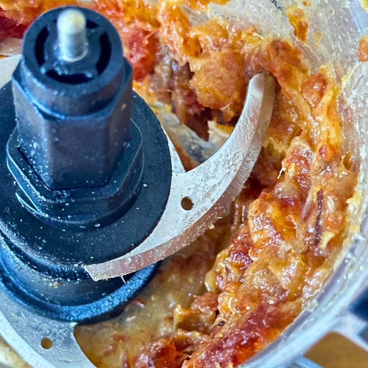 Medjool dates processed into a paste in a food processor.