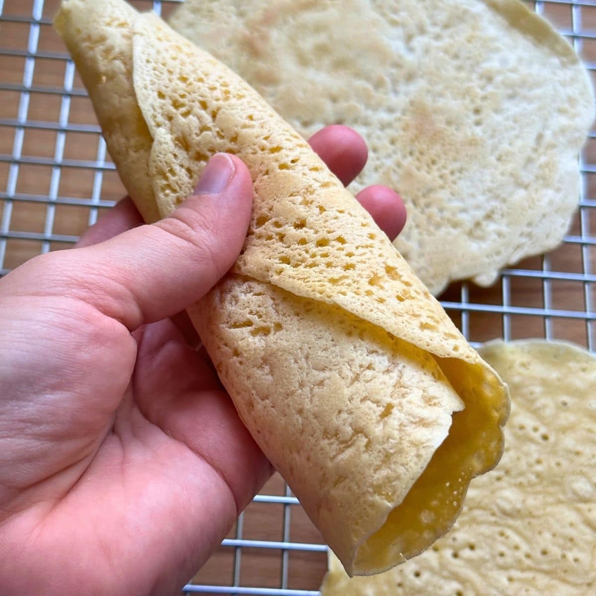 Chickpea flour tortilla rolled into a wrap.