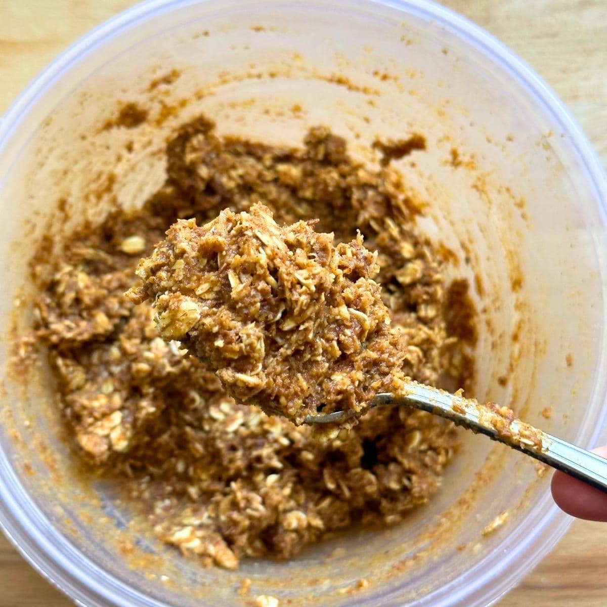 Pumpkin protein ball dough mixed together in a bowl. 