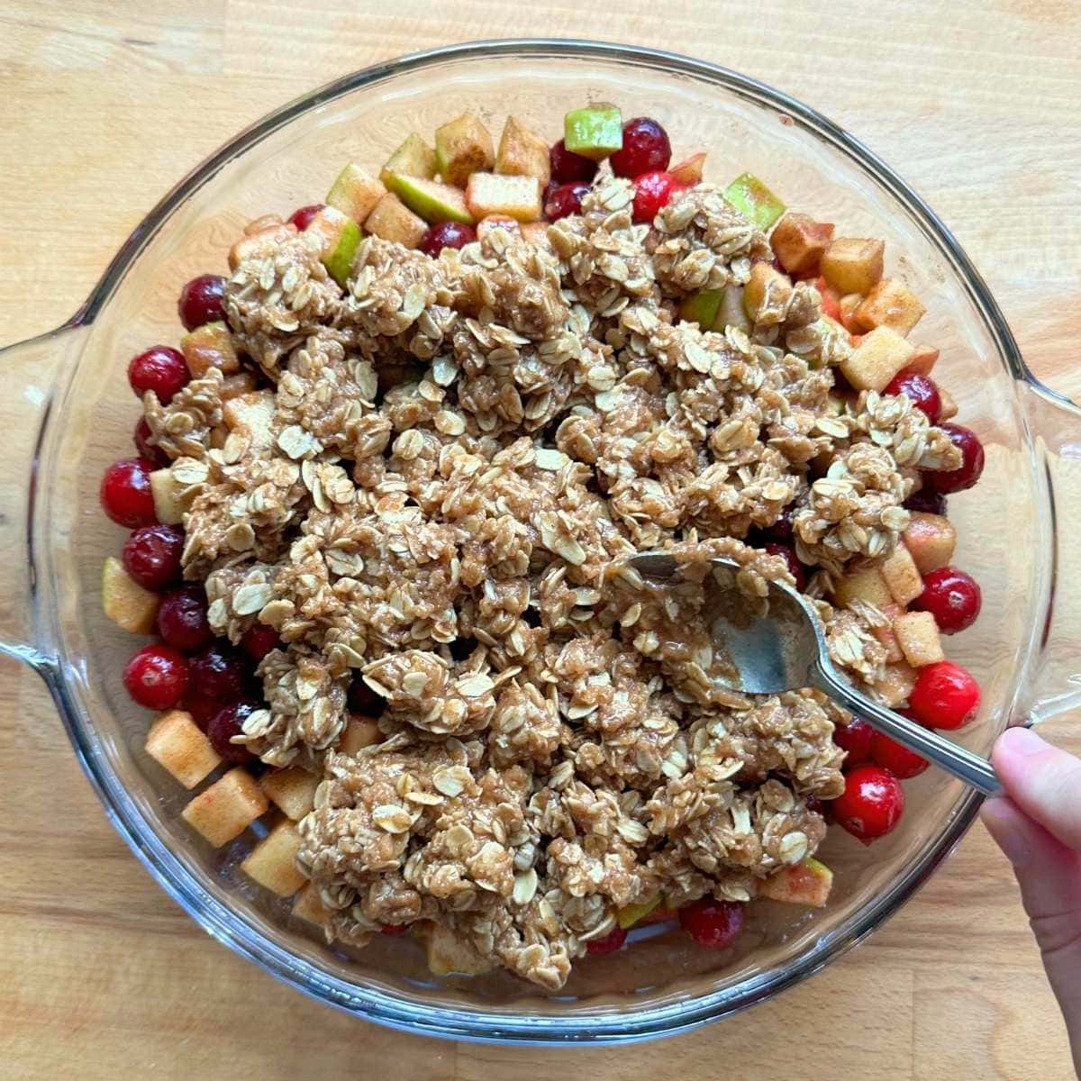Topping filling with oat crisp topping.
