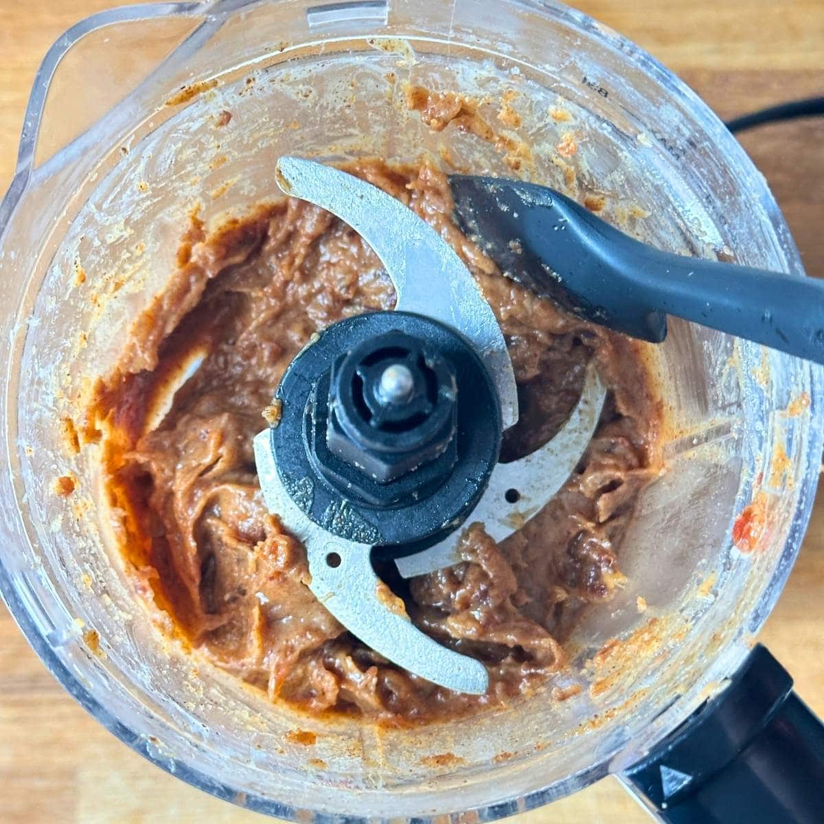 Dates and almond butter blended in a food processor.